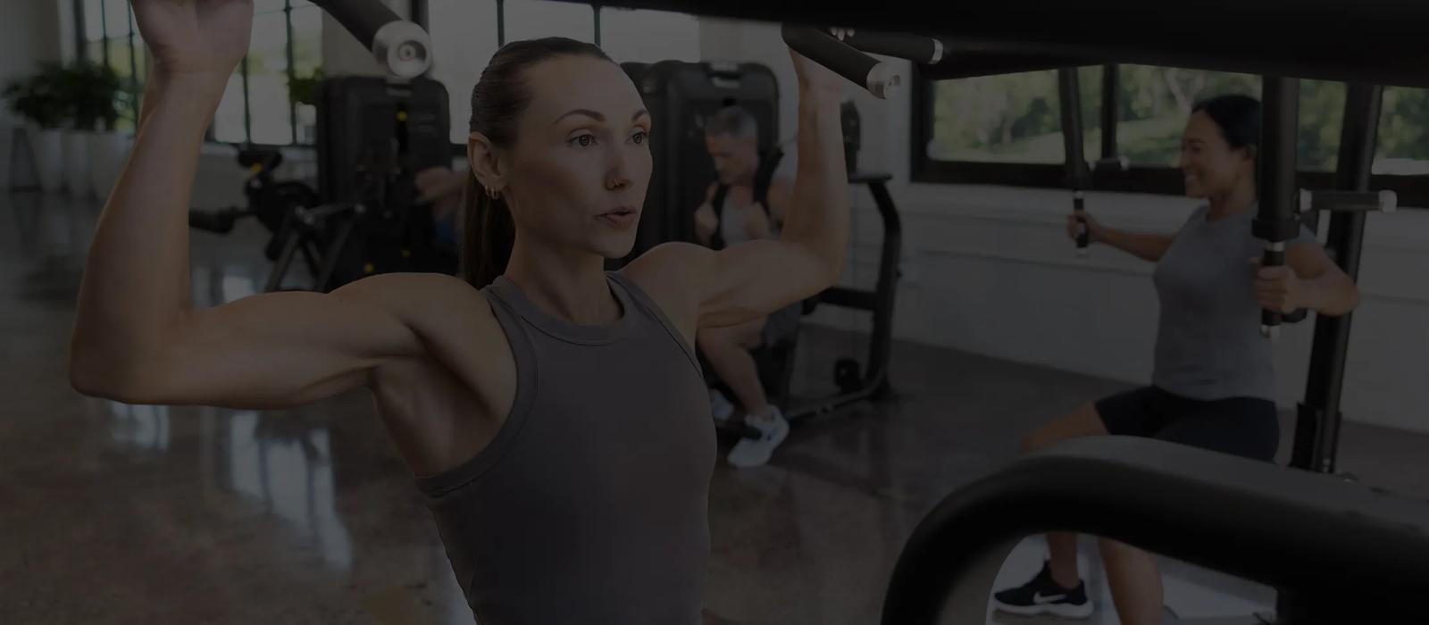 Modern gym equipped with Vision Fitness treadmills and strength machines